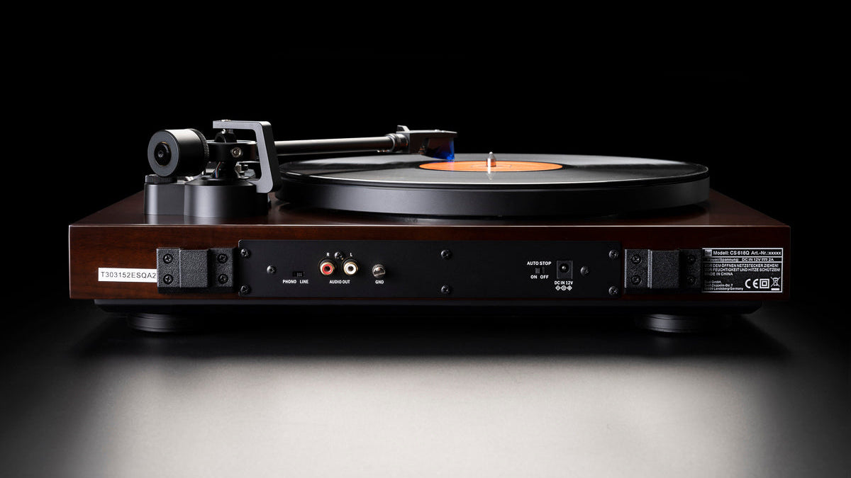 Turntable with a record on a dark background